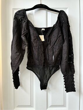 Free People “Regina Bodysuit” Black Eyelet Lace Puff-Sleeve Bodysuit